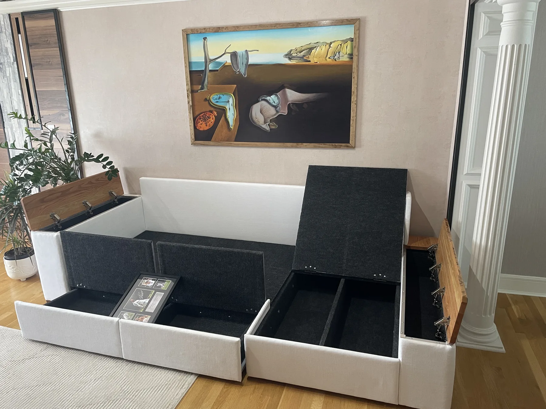 Sectional with hidden storage compartments open